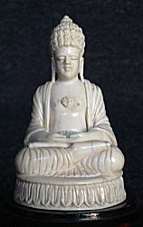 Fine Ceylonese Ivory Buddha seated in meditation posture or dhyana mudra (3 in. high) - early 20th C